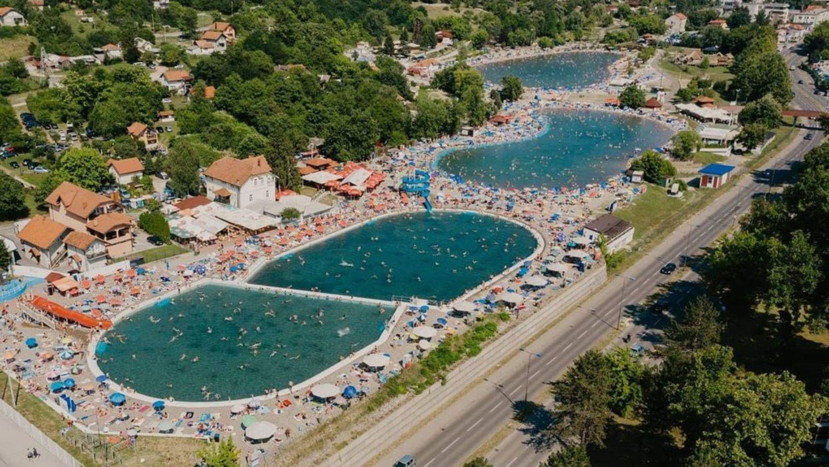 The Pannonian salt lakes from the air in summer, crowded with swimmers